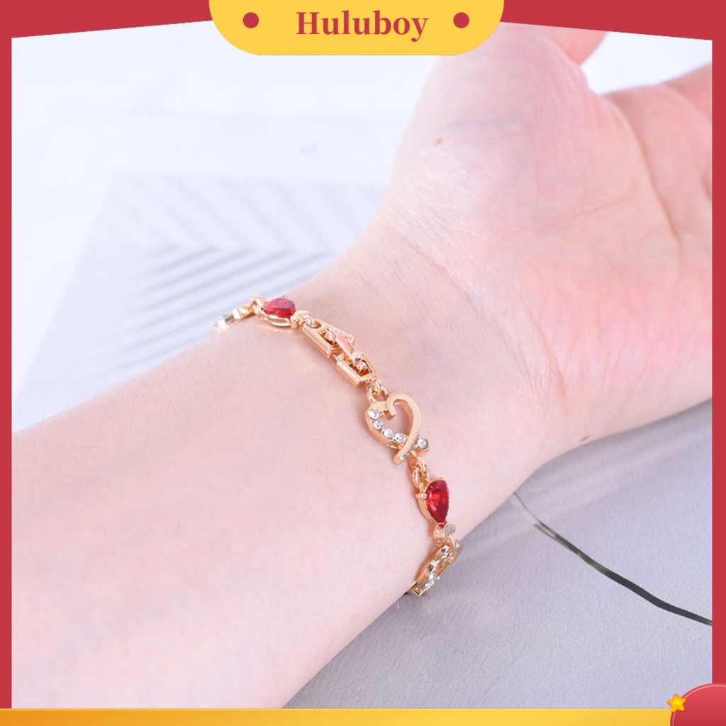 Gelang Rantai Desain Hati Hollow Aksen Berlian Imitasi Warna Merah Bahan Alloy Untuk Wanita