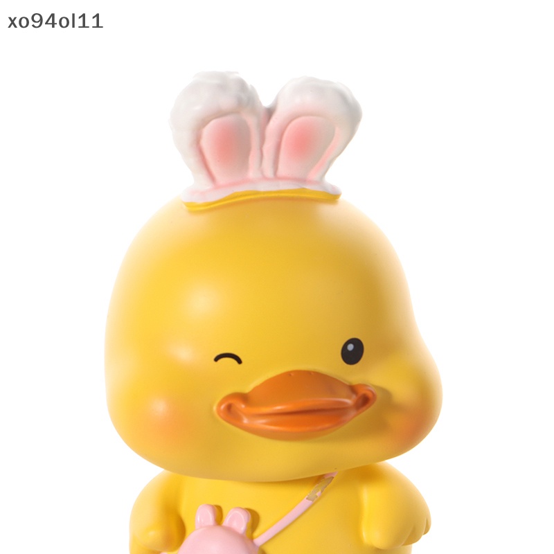 Xo Ornamen Mobil Lucu Resin Busur Bando Bebek Goyang Kepalanya Boneka Mobil Dekorasi OL