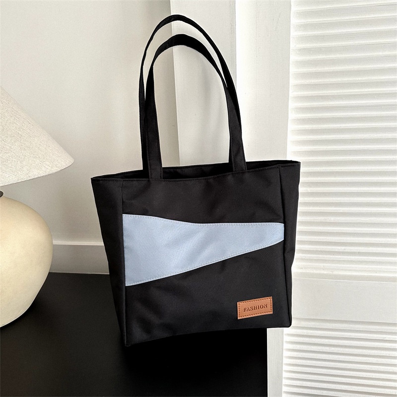 Tas wanita import berkualitas harga grosir bisa cod Kain Oxford kapasitas besar tas santai 2023 musim semi dan musim panas gaya baru tahun ini fashion satu bahu tas ketiak tas ember