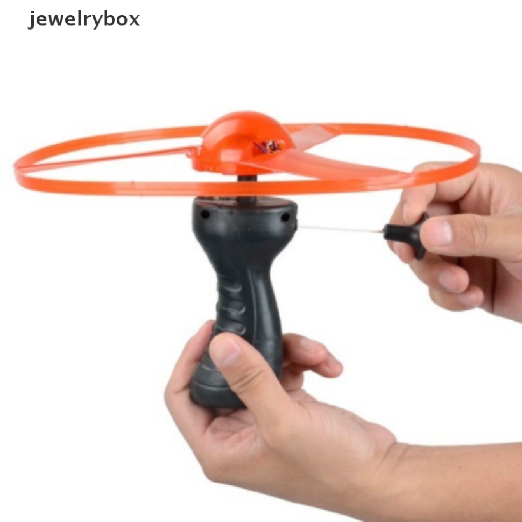 [jewelrybox] Lucu Spinning Flyer Luminous Flying UFO LED Light Handle Flash Flying Toys Butik