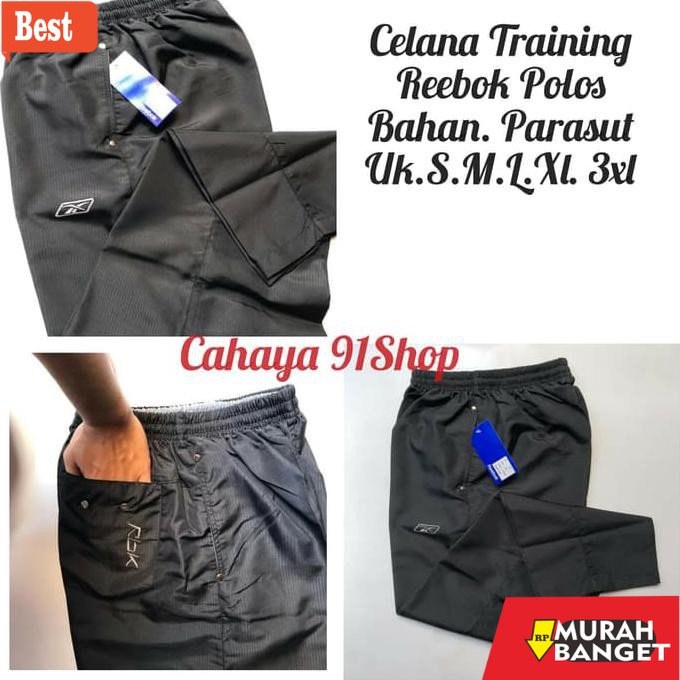 Celana olahraga terbaru- Celana Panjang Pria Wanita Training Reebok Polos Parasut Olahraga Gym