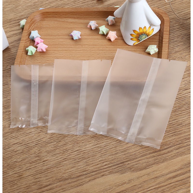 

100 PCS PLASTIK SEALER MOON CAKE PLASTIK POLOS DOFF NASTAR BANYAK UKURAN