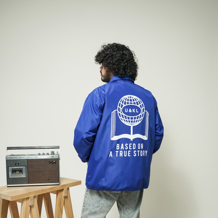 UNKL347 Jaket Pria Windbreak Biru Sablon CEKT