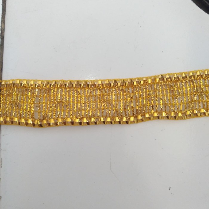 kain renda emas meteran