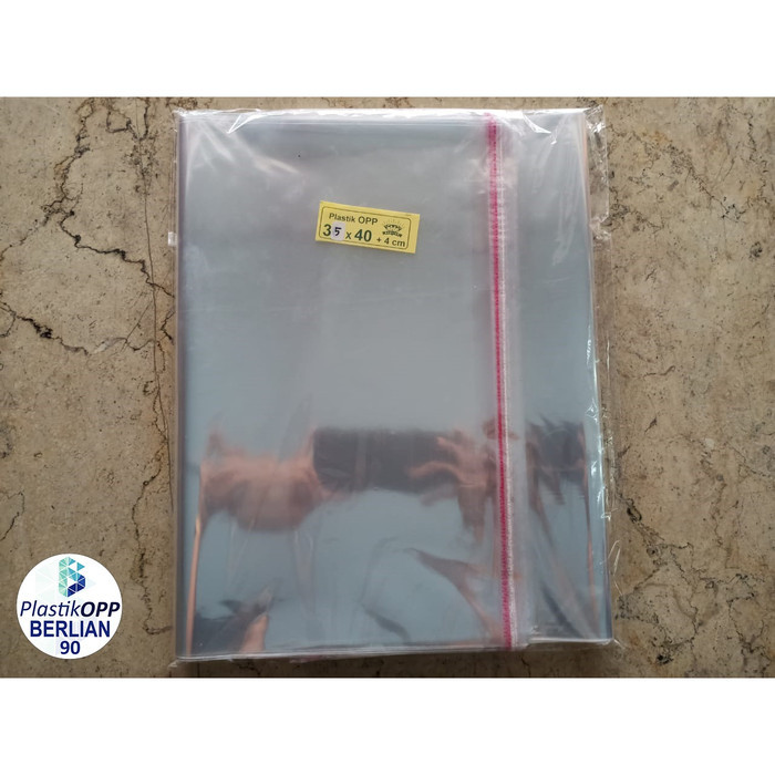 

PLASTIK OPP 35X40 CM 20 MIC PLASTIK BAJU / PLASTIK SEAL ISI 100 LBR