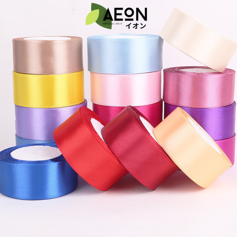 

AEON - PTA8 SATIN Pita Satin Roll Motif Setangan Satin dan Transparan Modern Pita Kado 4cm/Pita Dekorasi Buket
