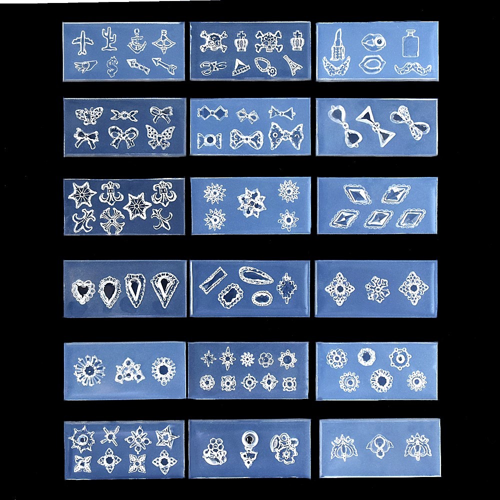 

Silicone Mold Tiny Nail Art Flowers Heart Bear Fruit Shell Animal Epoxy Resin Casting Molds For DIY Epoxy Resin Nail Art Crafts