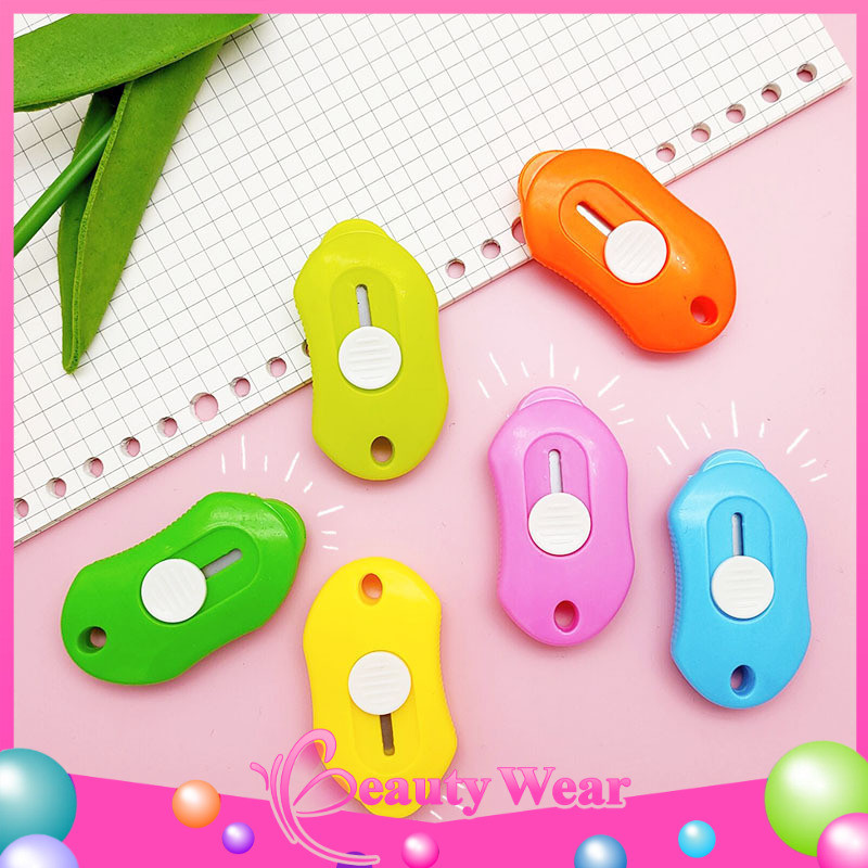 

Cutter Mini Portable Pisau Pemotong Kertas Cutter Sekolah 793