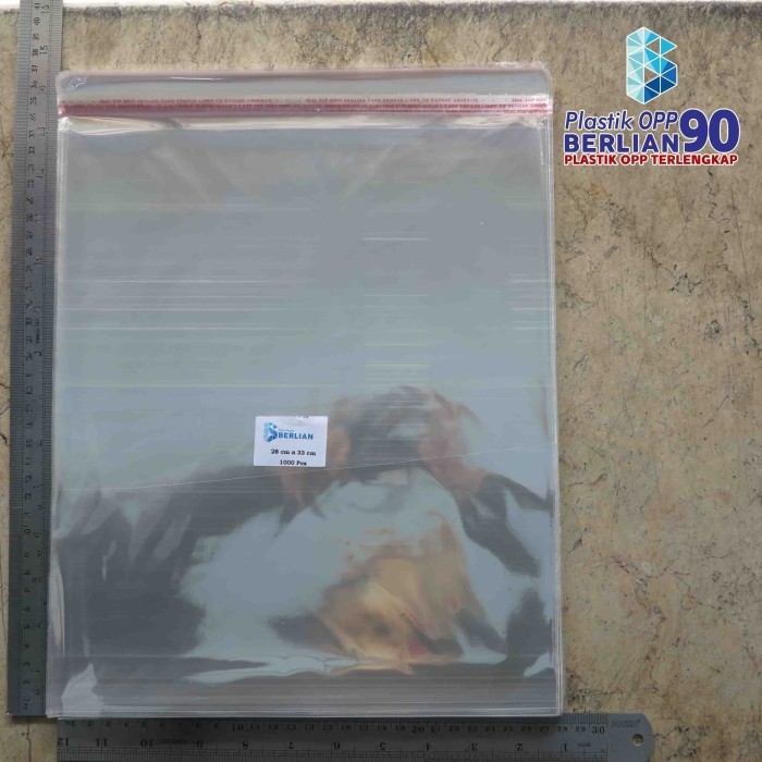 

PLASTIK OPP 30X38 CM 20 MIC PLASTIK BAJU / PLASTIK SEAL ISI 100 LBR