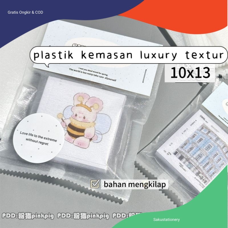 

Plastik Kemasan Alas Packing Bahan Mengkilap Free Hang tag 10x13cm