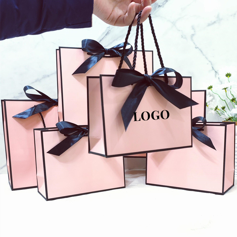 

50Pcs Kraft Paper Bag Custom Logo Trademark Tote Bag With Bow Knot Packaging Bag Gift Clothing Store Shopping Wrapping Paper Bag