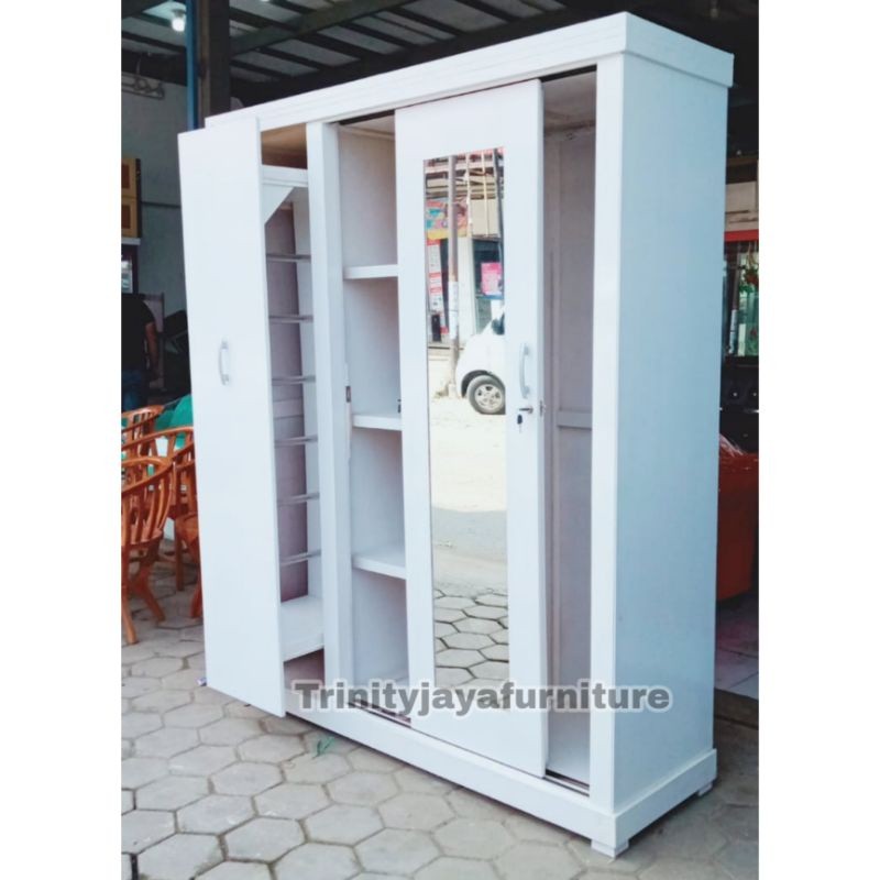 Lemari Pakaian Sliding Hijab Plywood Trinityjayafurniture