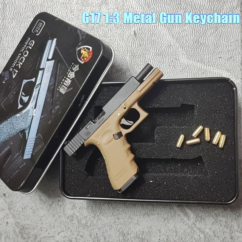 

1:3 Pistol Gun Model G17 with Bullets Throw the shell Metal Key chain Ornament PUBG Toy Decoration Crafts Figurines & Miniatures