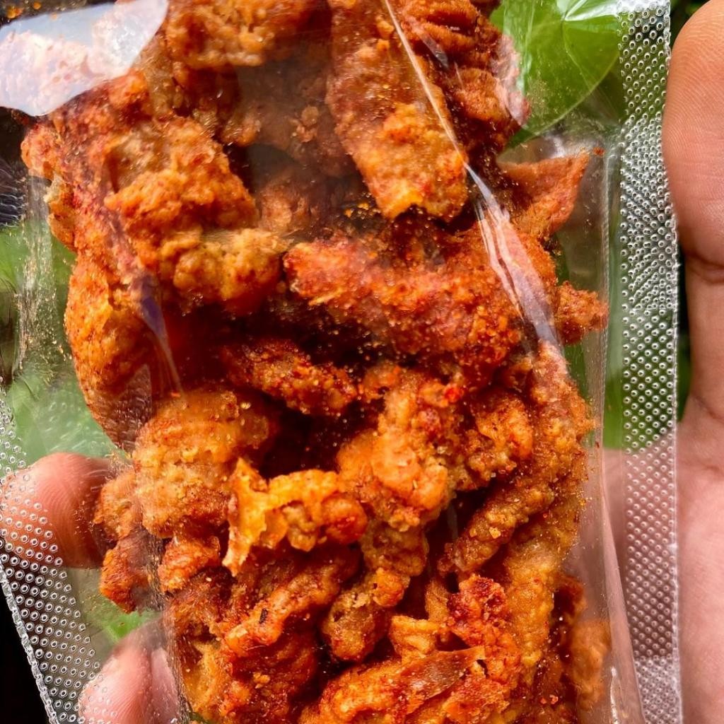 

Kulit Ayam Krispy kemasan 100 gram Pedas Daun Jeruk