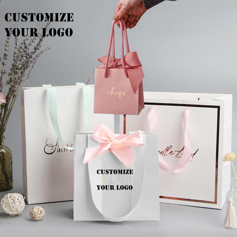 

100Pcs/Batch Multicolor Kraft Paper Custom Logo Printing Jewelry Bag Clothing Shopping Bag Storage Bag Bow Tie With Handle