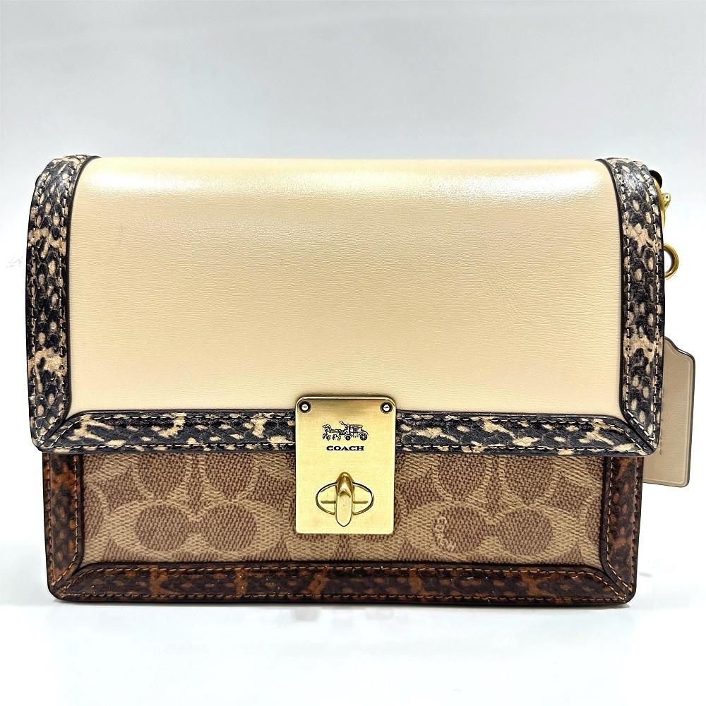 Coach Hutton Shoulder Bag in Signature Tan Ivory Snakeskin