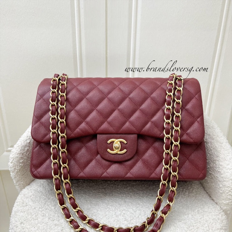 (Pre-loved) Chanel Classic Jumbo Double Flap in 18C Burgundy Dark Red Iridescent Caviar and AGHW