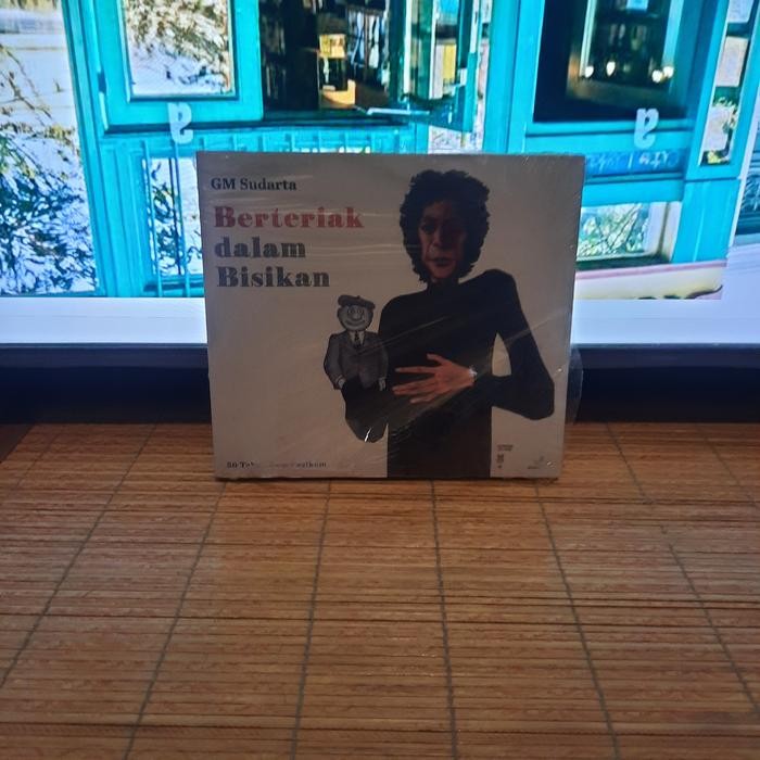 Berteriak dalam Bisikan 50 Tahun Oom Pasikom - GM Sudarta
