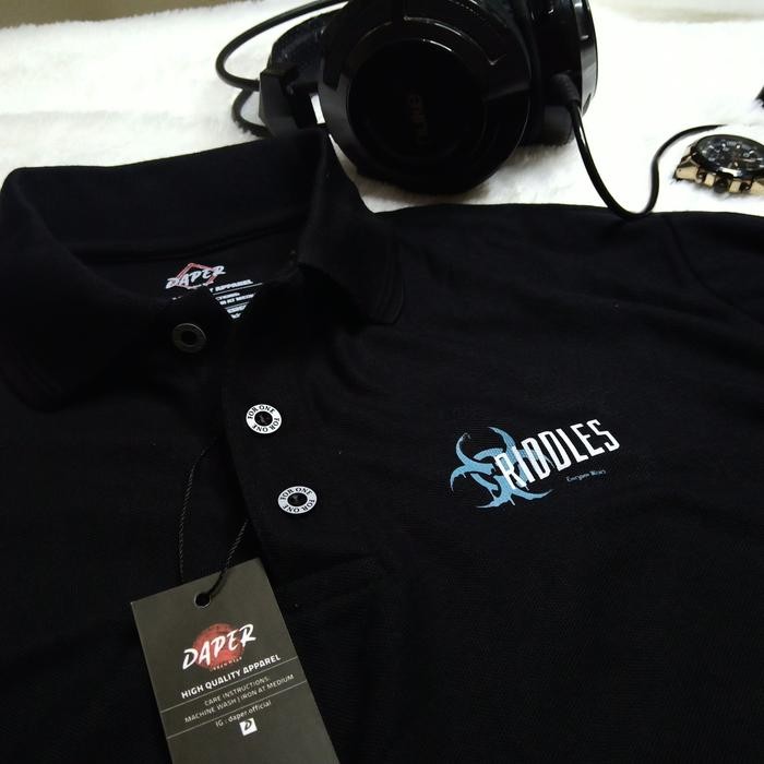 Kaos Kerah Pria Distro Polo Shirt Jumbo Big Size Motif Riddles - Hitam, M