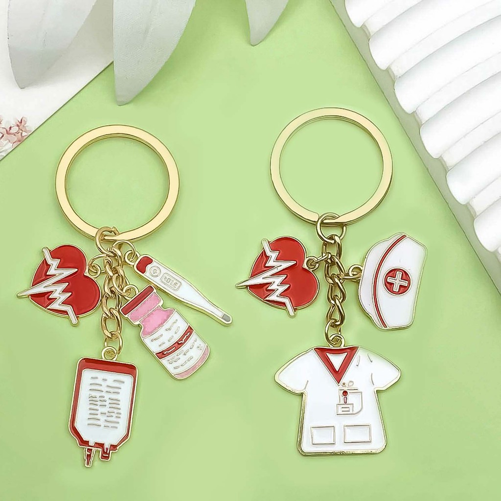 

1pc Enamel Medical Keychain, Alloy Nurses Cap, Medicine Bottle, IV bag, Heart Key Ring, Jewelry Gift For Doctors And Nurses