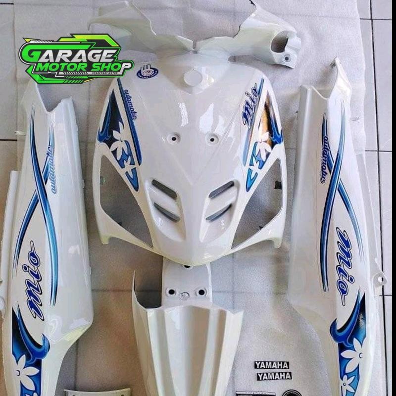 bodi halus Mio smile warna putih+stiker bunga bunga