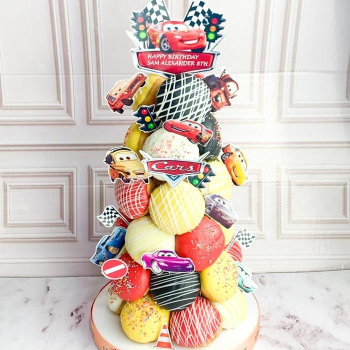 

Donat/Donat Ulang Tahun/Donat Birthday/Donat Tower tema Cars/Donat Birthday Catering Malang DMT