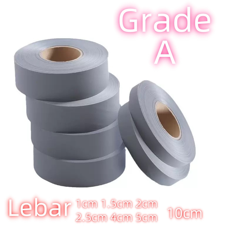 

Pita Scotlight Scotlite Skotlet Kain / Pita Reflective Kain Grade A abu-abu Lebar 2.5cm 5cm 200mtr/roll