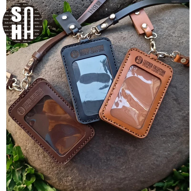 

GANTUNGAN ID CARD 2 SISI / 2 MIKA /BULAK BALIK BAHAN KULIT BISA CUSTOM LOGO DAN NAMA