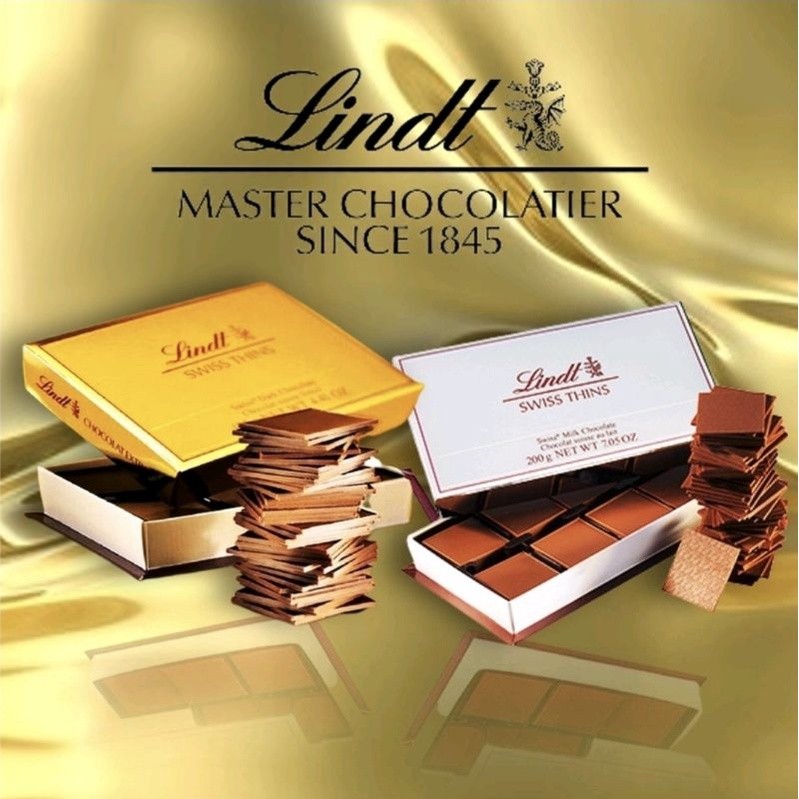 

Lindt Swiss Thins Milk Dark Chocolate 125 gram Coklat Import Swiss Cokelat Hitam & Milk 48 pc Delicate Swiss Chocolate Thin Lindt Asli Impor Swiss