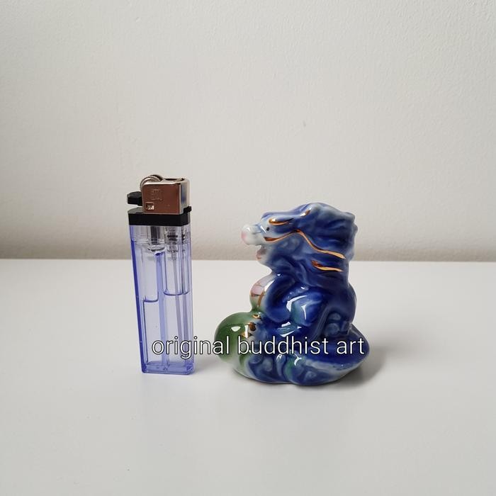 patung shio naga keramik