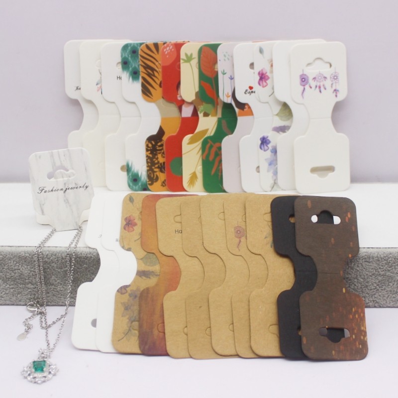 

100 pcs 9x3.5cm latest printed jewelry necklace bracelet hang tag kraft paper folding necklace earring set packaging card