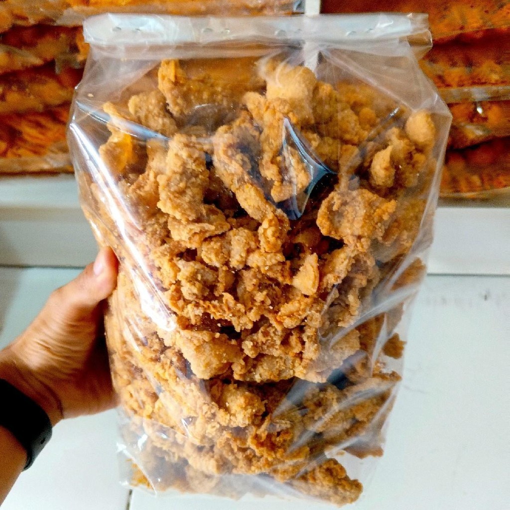 

Kulit Ayam Crispy Pedas Daun Jeruk Dan Original Gurih 500GR - Snacks - Food Makanan Ringan