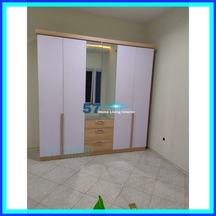 Lemari Pakaian Minimalis - Lemari Pintu Kaca Bahan Plywood HPL