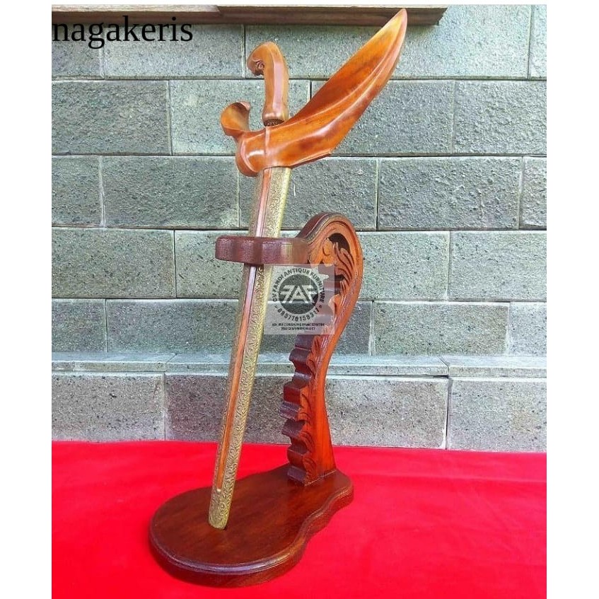 

jagrak keris isi 1 minimalis ukiran jepara finishing BM02757 terlaris murah