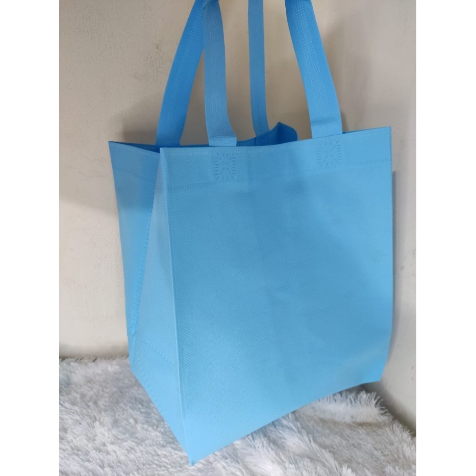 

Kiky Tas Spunbond Kotak Ukuran 21.5 x 20 x 27 Isi 12 pcs