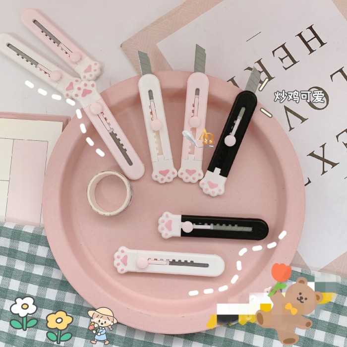

Cutter Mini / Cutter Portable Motif Paws Lucu
