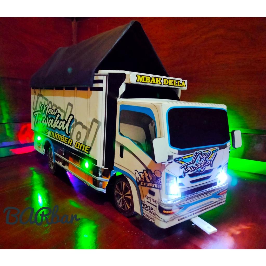 truk oleng tawakal 5 putih lampu terpal
