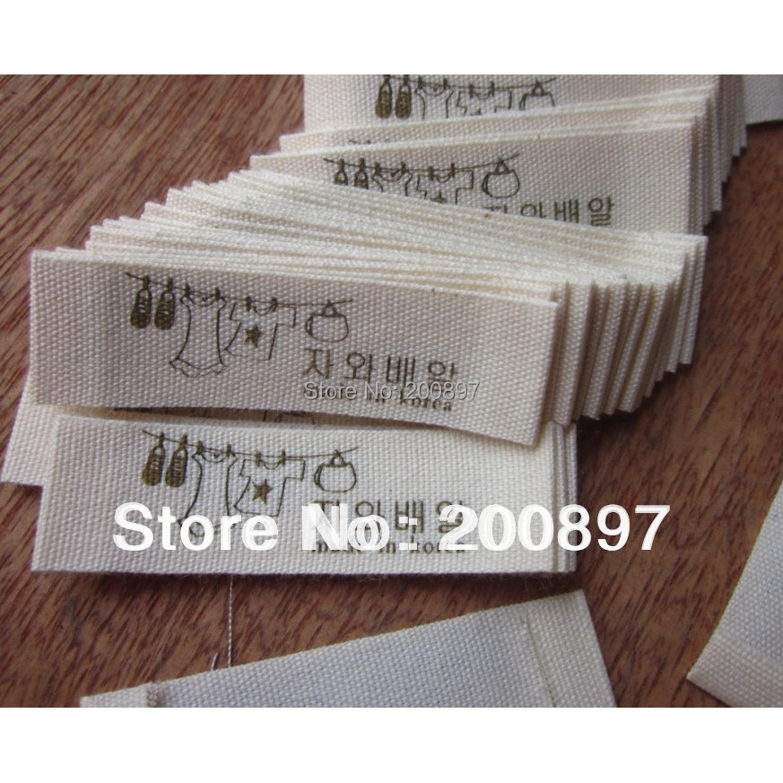

custom logo printed pure cotton clothing labels beige bottom colors separate cut and end folded 1000pcs lot