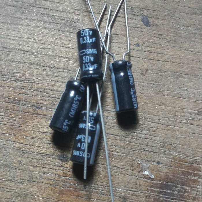 kapasitor asli 0.33uf 50v elko elco capasitor 0.33 uf 50 v asli 0,33uf 0 33 nippon chemicon Fajar el