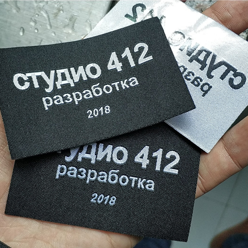 

500pcs Custom hot iron glue on black cloth label 7 * 4.5 cm Big size Straight cut Heat press Garment Labels