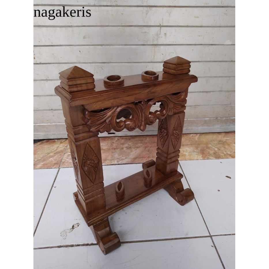 

Jagrak tempat keris Bahan kayu jati Ukiran minimalis Isi 2 keris terlaris murah