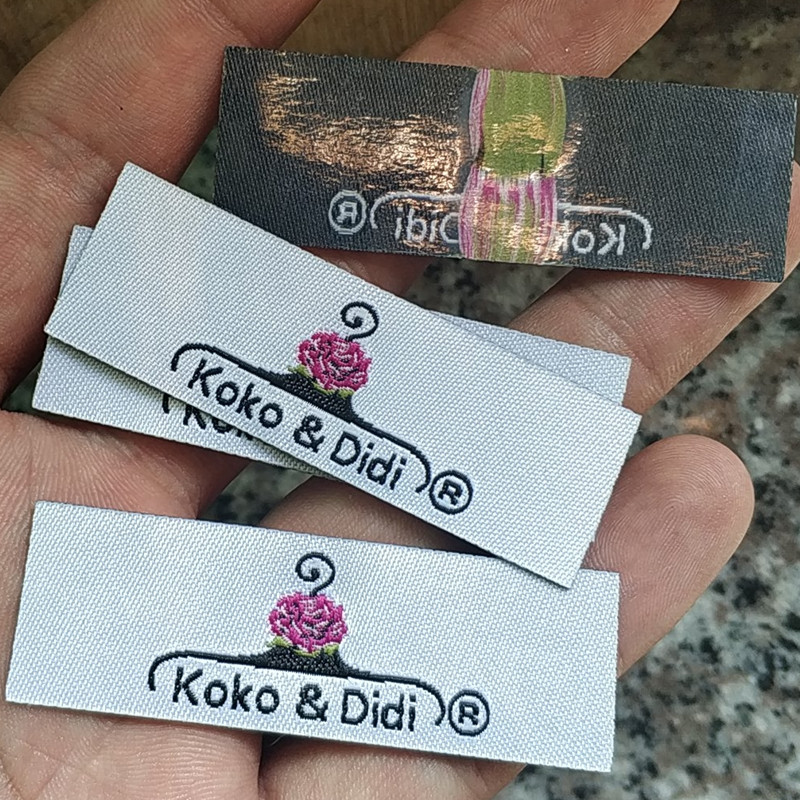 

500pcs Custom Iron on Floral cloth label 6 * 2 cm Straight cut hot melt glue Heat press Garment Labels