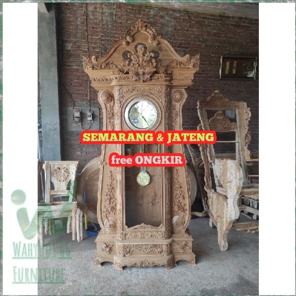 lemari jam hias bagong kayu jati