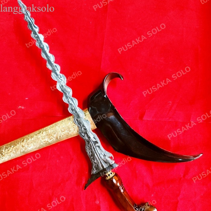 

KERIS LUK 29 LUK BANYAK PAMOR PEDARINGAN KEBAK antik