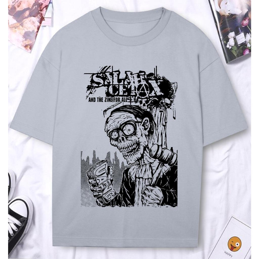 Kaos Distro Cowo Baju Distro Pria Tshirt Cowo Salah Cetak Uang Korupsi RUB052 SS