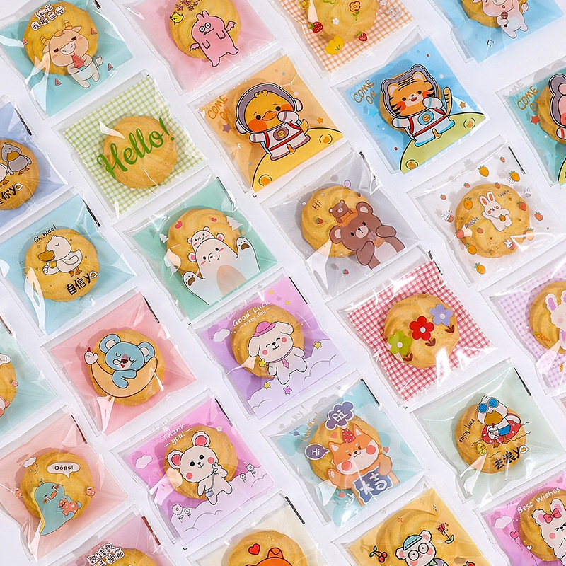 

( UNIQ ) (100 PC) PLASTIK COOKIES KAWAII LUCU 7X7 CM /10x10cm PLASTIK KEMASAN SUDAH ADA LEM MOTIF KARTUN LUCU / PLASTIK KUE