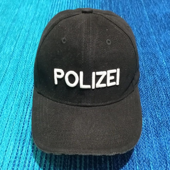 Topi pria simpel Polizei Vetements