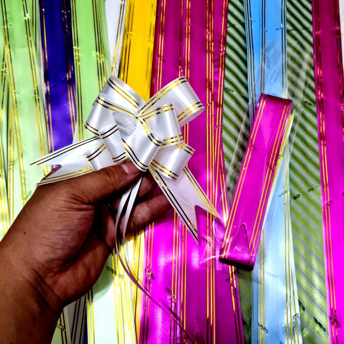 

P35 BESAR PITA SERUT KADO RIBBON JADI PARCEL PER PAK ISI 2 MIX RANDOM