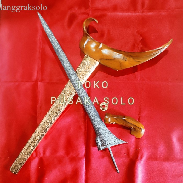 

KERIS TILAM PAMOR PEDARINGAN ALUSAN ISTIMEWA antik