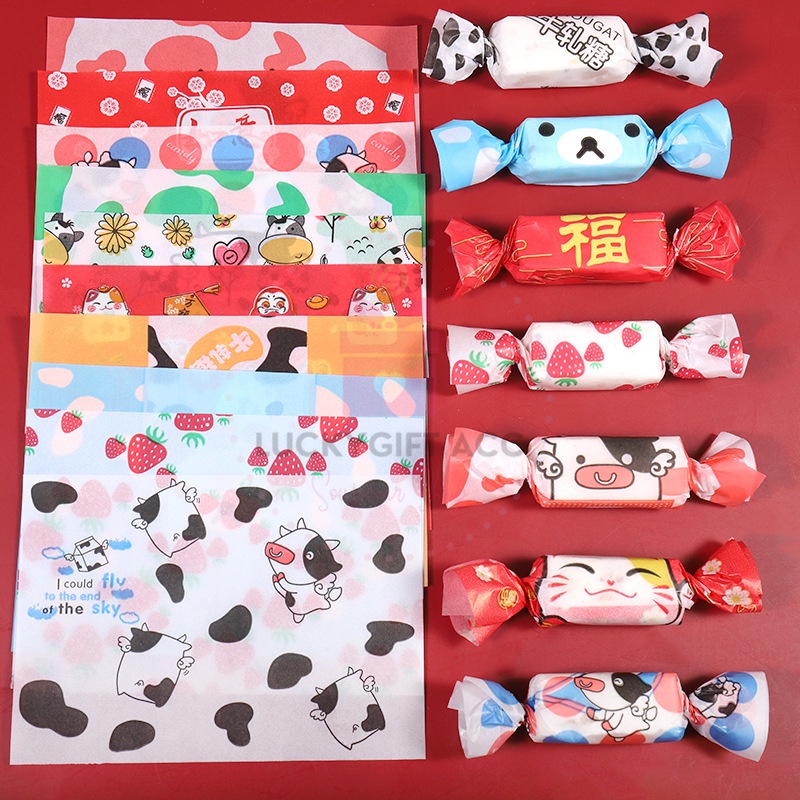 

TOKO LOUVI (100pcs) KERTAS PEMBUNGKUS PERMEN / KERTAS BUNGKUS NOUGAT MOTIF LUCU